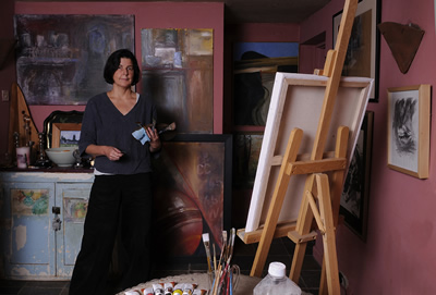 christina pierce, cricket artist, in her studio